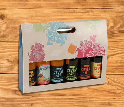 Granada cardboard suitcase containing 6 beers