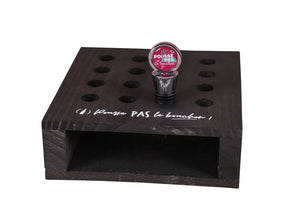 Maurice countertop display stand in black-stained wood for 16 bottle caps